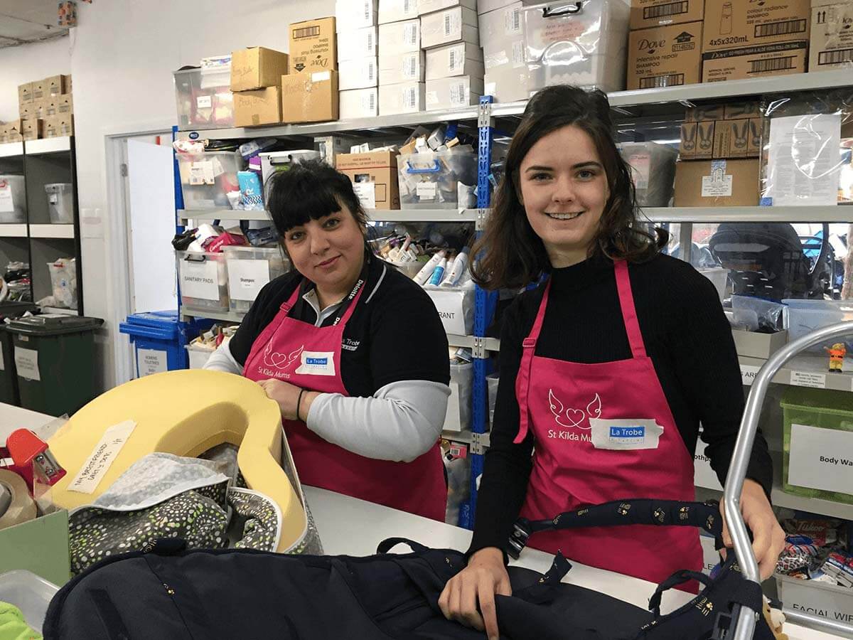 La Trobe Financial staff volunteering packing boxes in a warehouse